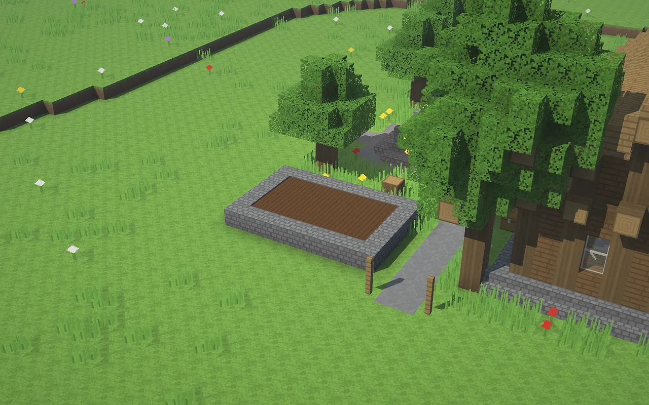 De tuin ligt binnen het kamp, naast de longhouse.